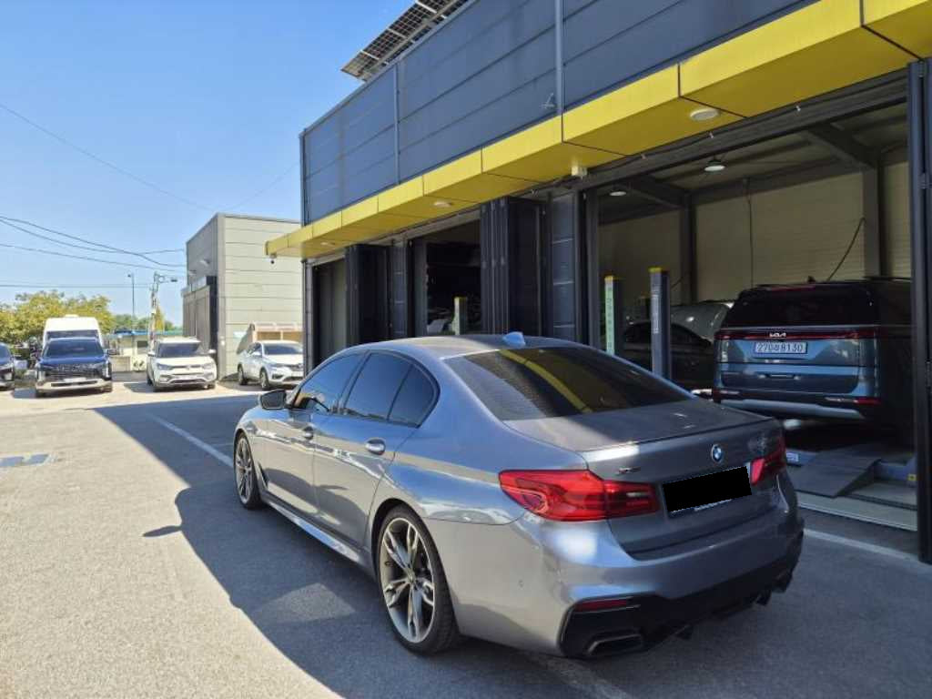 BMW 5-Series — photo 03