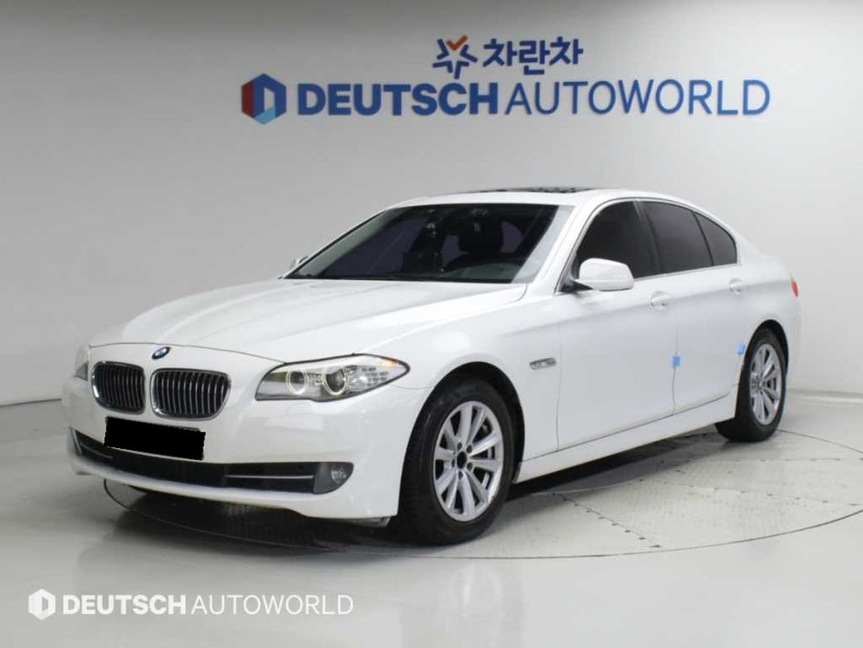 BMW 5-Series — photo 01