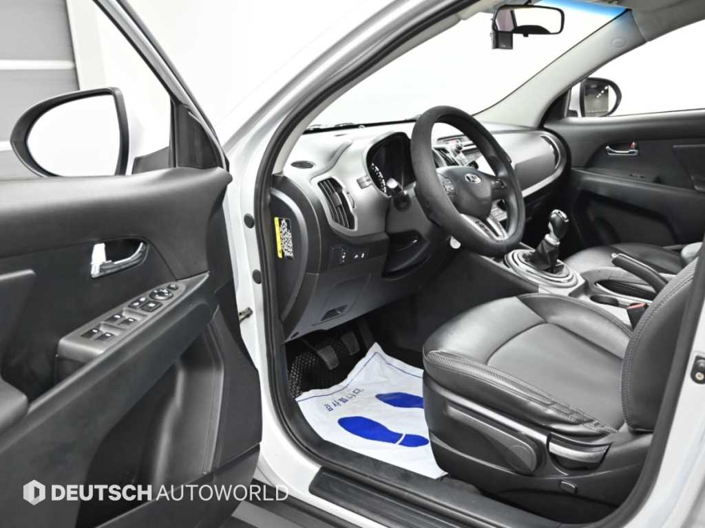 Kia Sportage — photo 11
