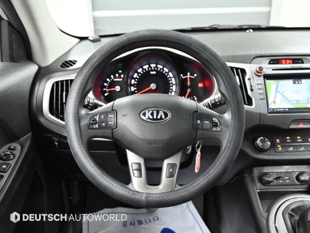 Kia Sportage — photo 13