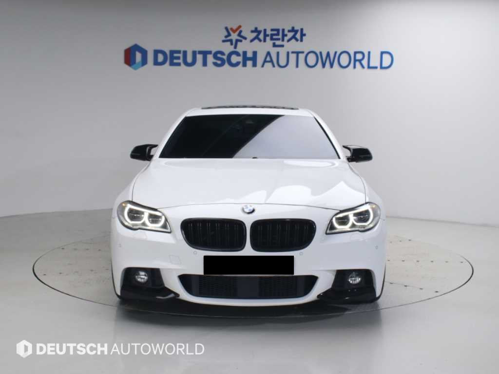 BMW 5-Series — photo 01