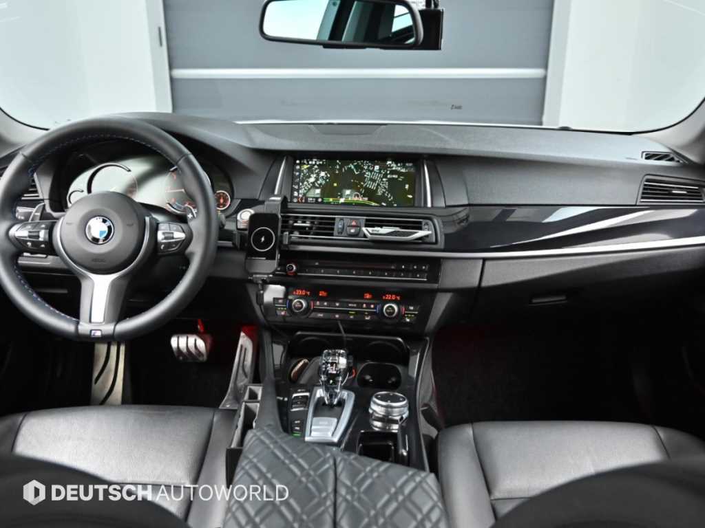 BMW 5-Series — photo 07
