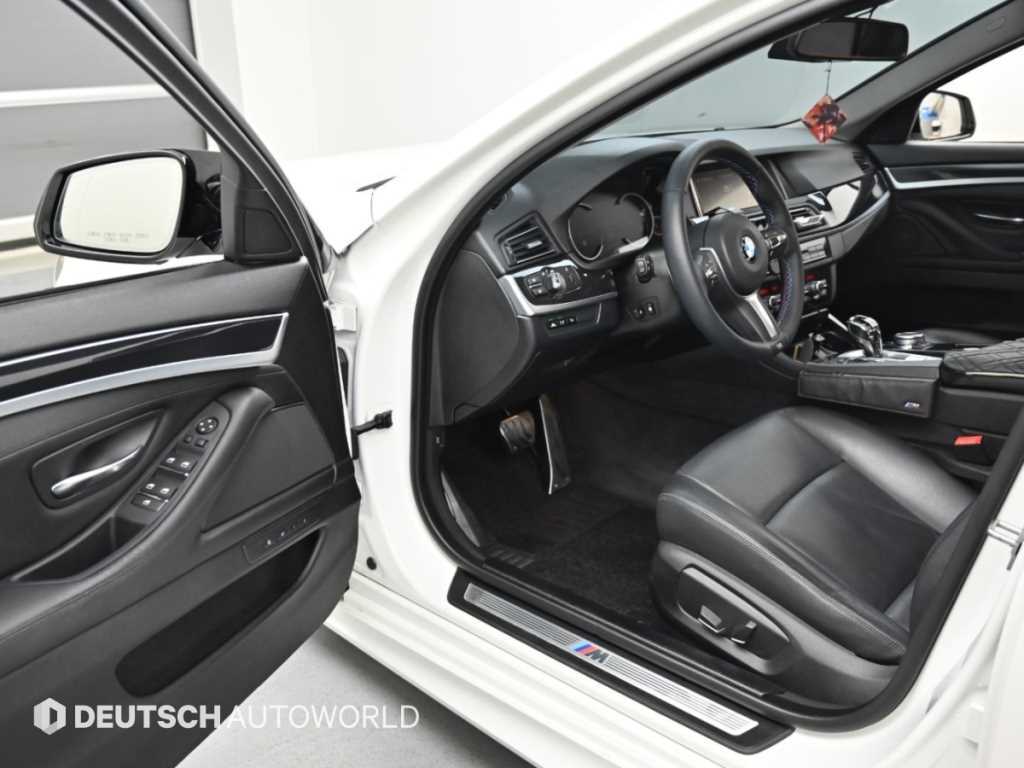 BMW 5-Series — photo 11