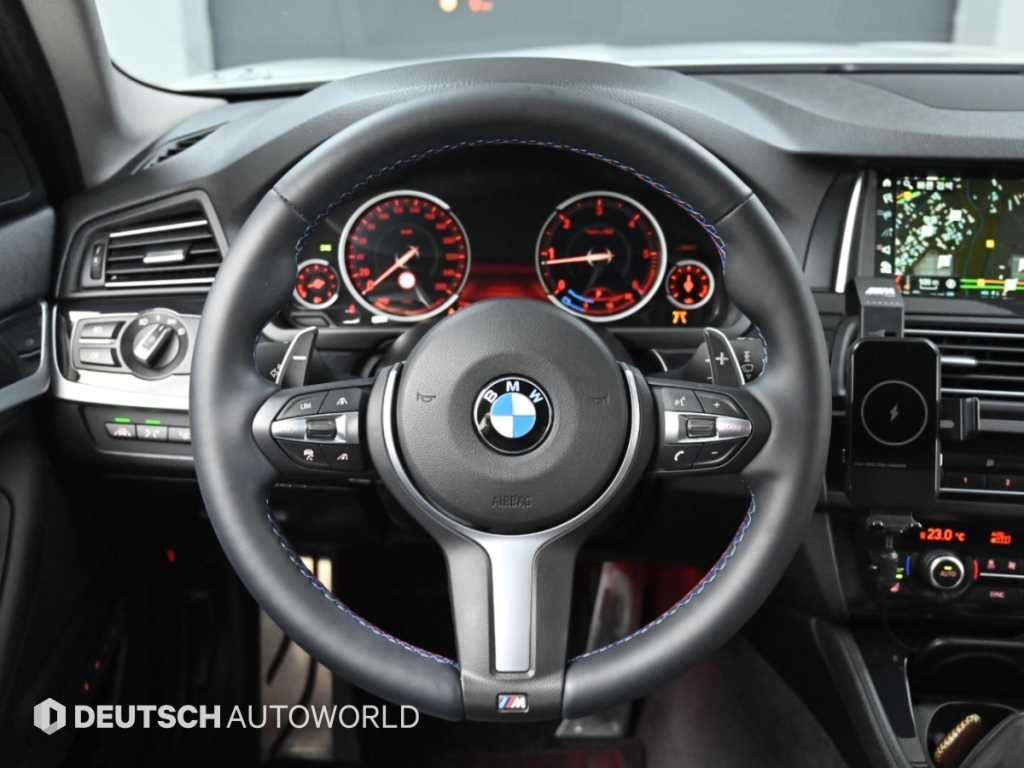 BMW 5-Series — photo 13