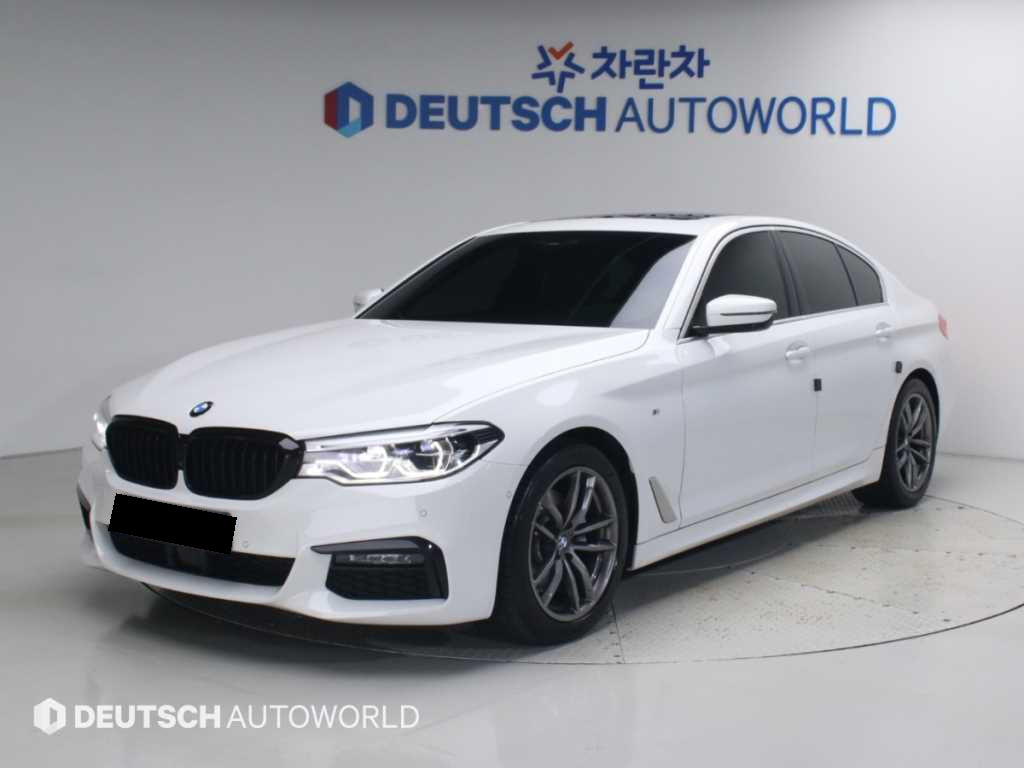 BMW 5-Series — photo 01