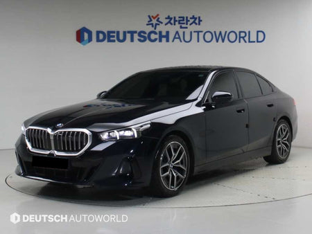 BMW 5-Series — photo 01