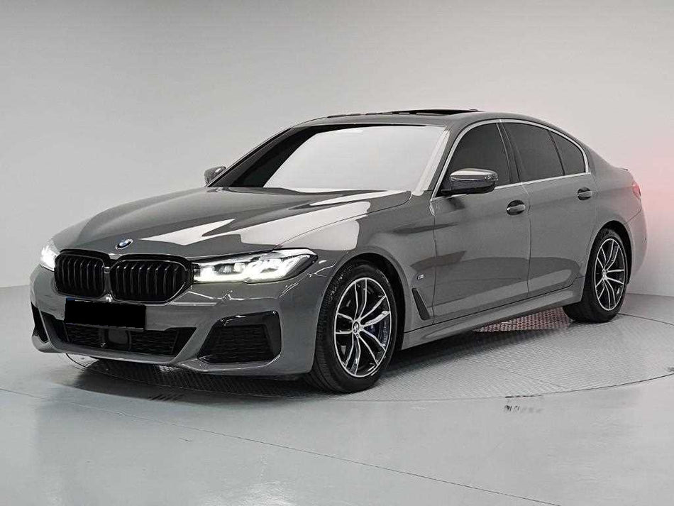 BMW 5-Series — photo 01