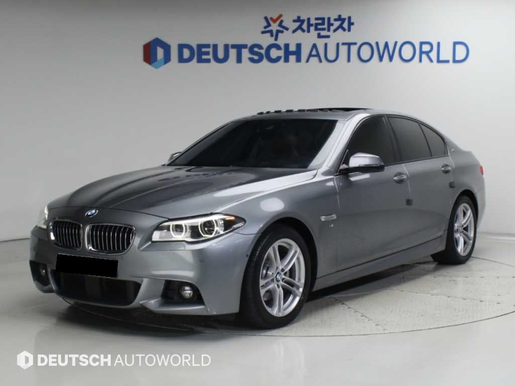 BMW 5-Series — photo 01