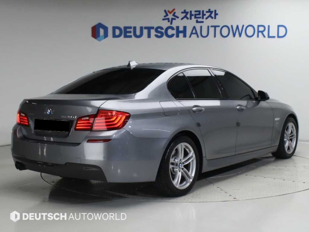 BMW 5-Series — photo 02