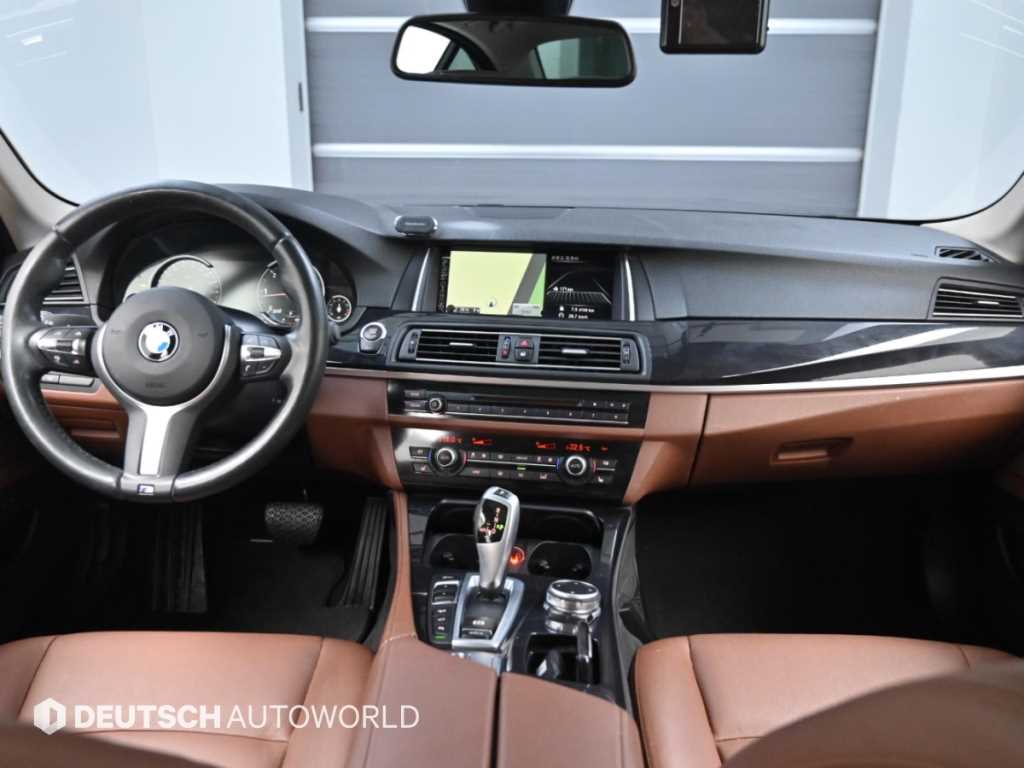 BMW 5-Series — photo 08