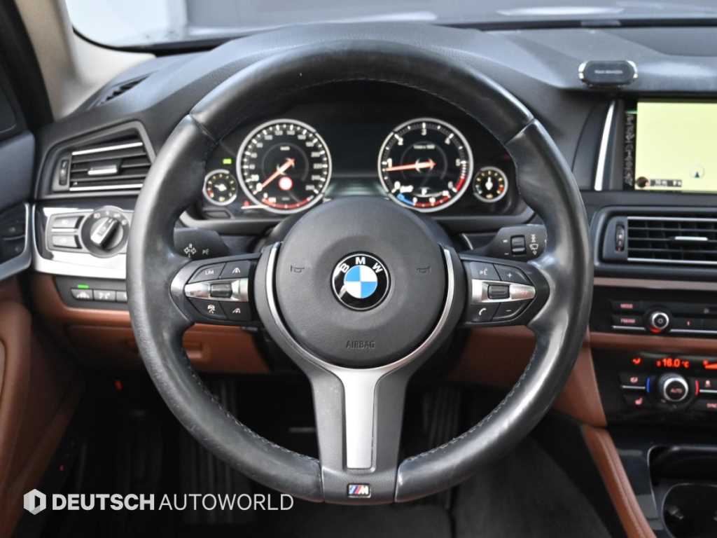BMW 5-Series — photo 14