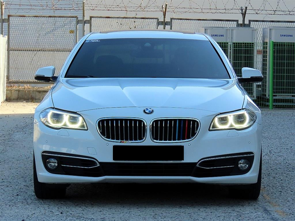 BMW 5-Series — photo 01