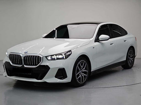 BMW 5-Series — photo 01