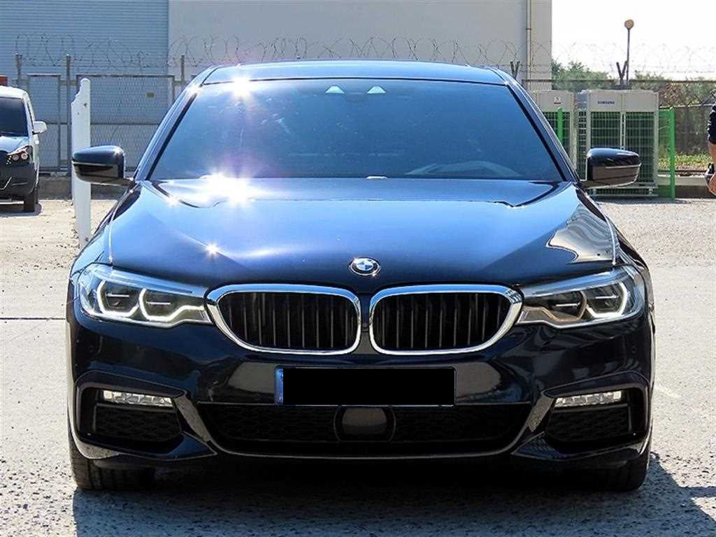BMW 5-Series — photo 01