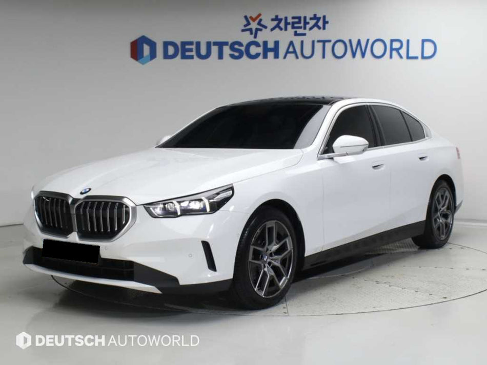 BMW 5-Series — photo 01