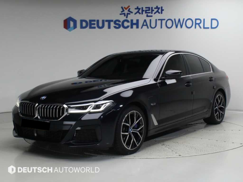 BMW 5-Series — photo 01