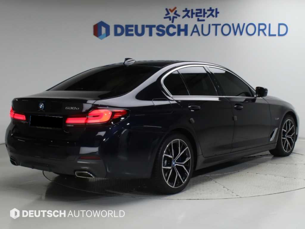BMW 5-Series — photo 02
