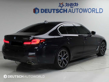 BMW 5-Series — photo 02