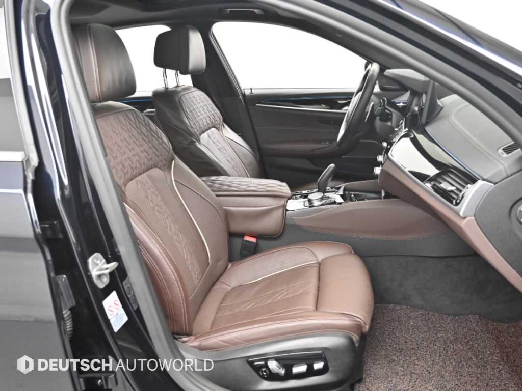 BMW 5-Series — photo 10