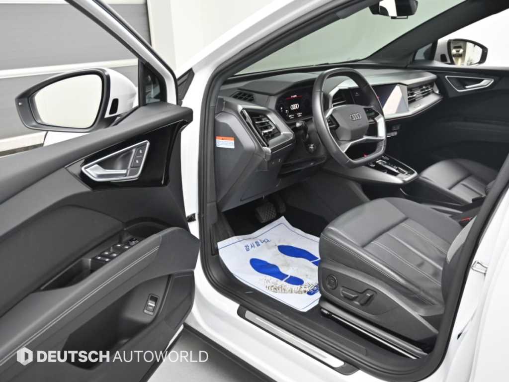 Audi Q4 e-tron — photo 11