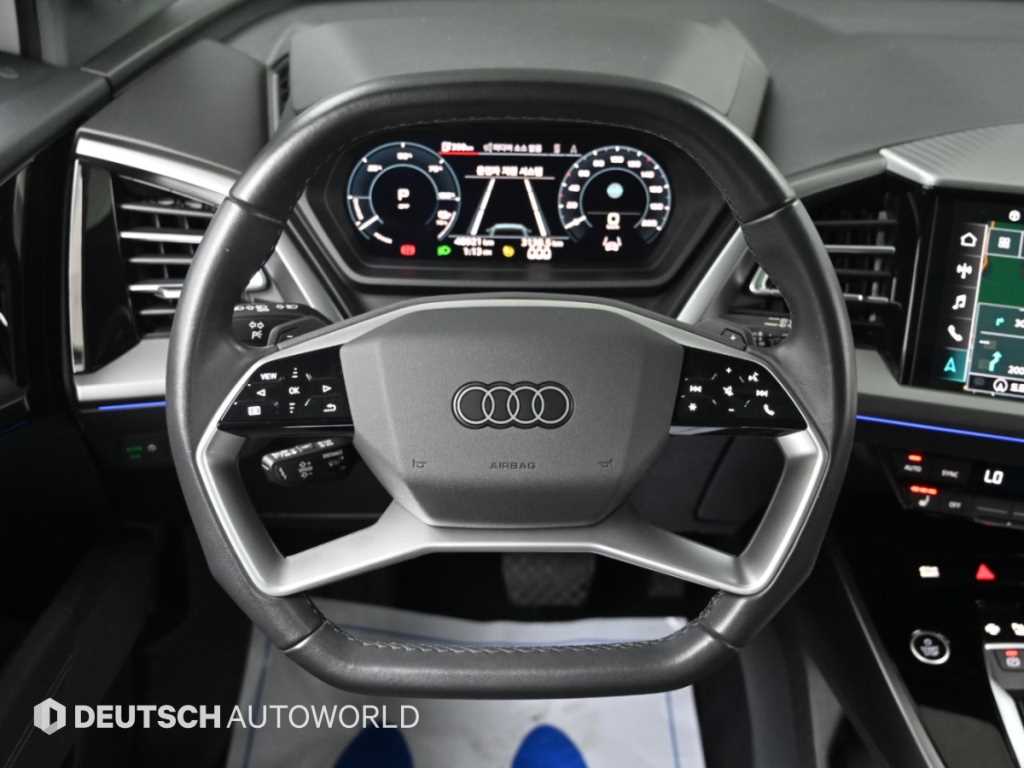 Audi Q4 e-tron — photo 13