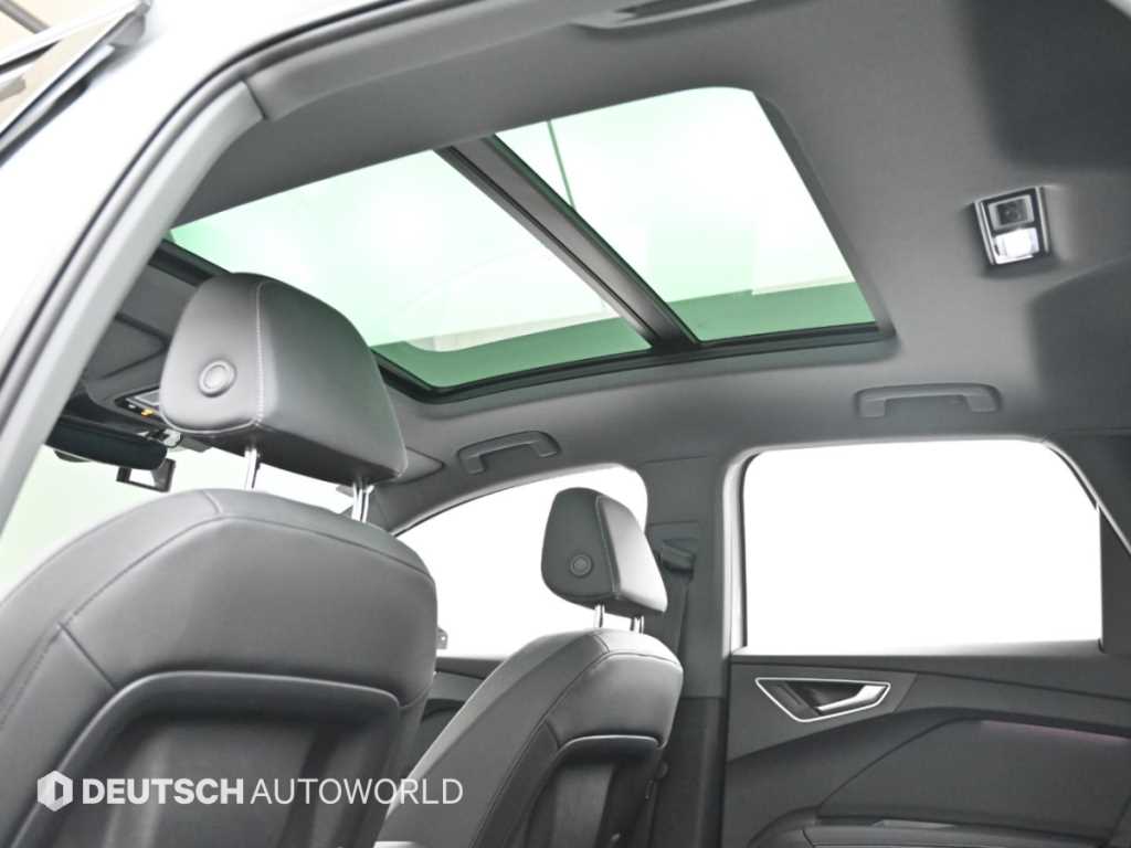 Audi Q4 e-tron — photo 18