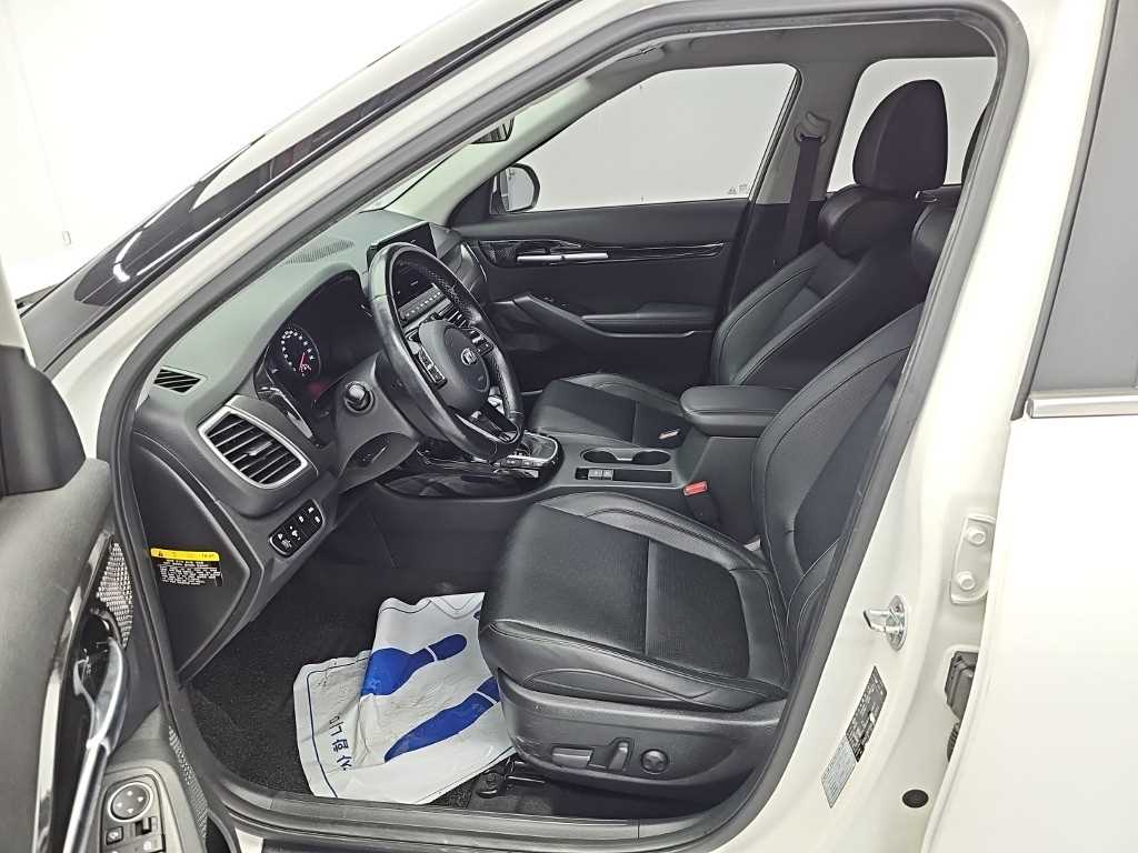 Kia Seltos — photo 11
