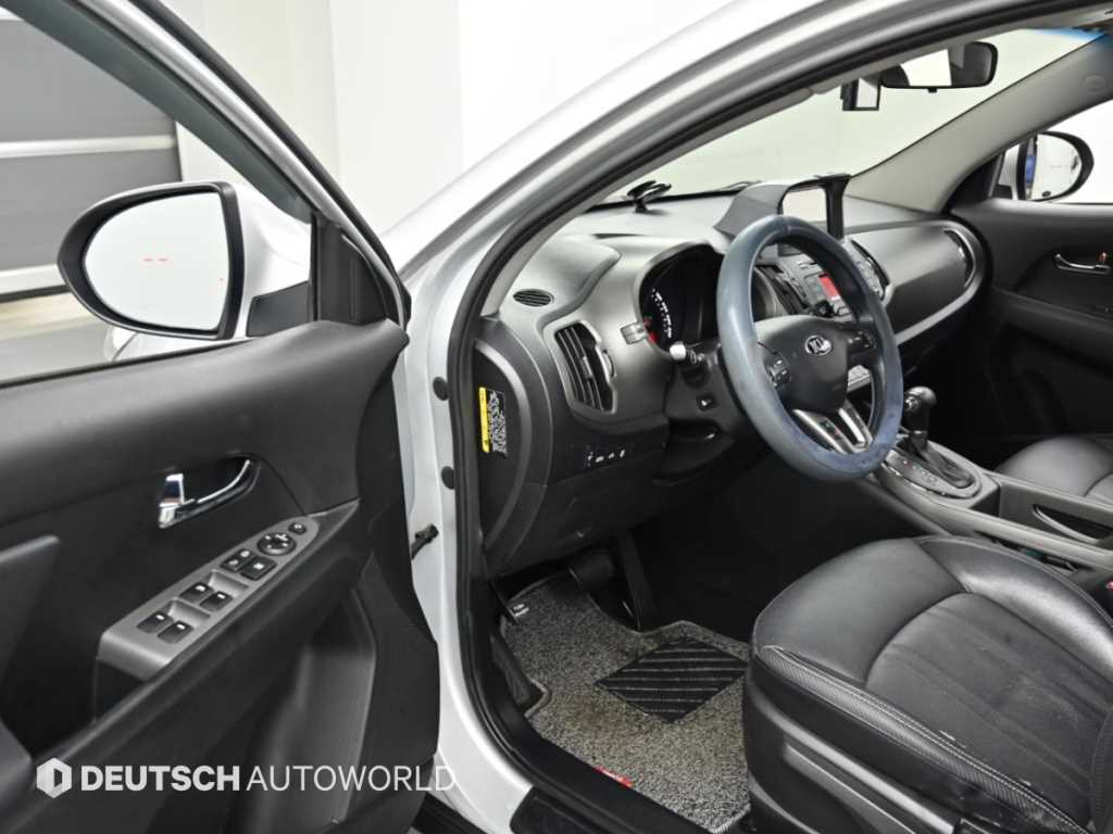 Kia Sportage — photo 11