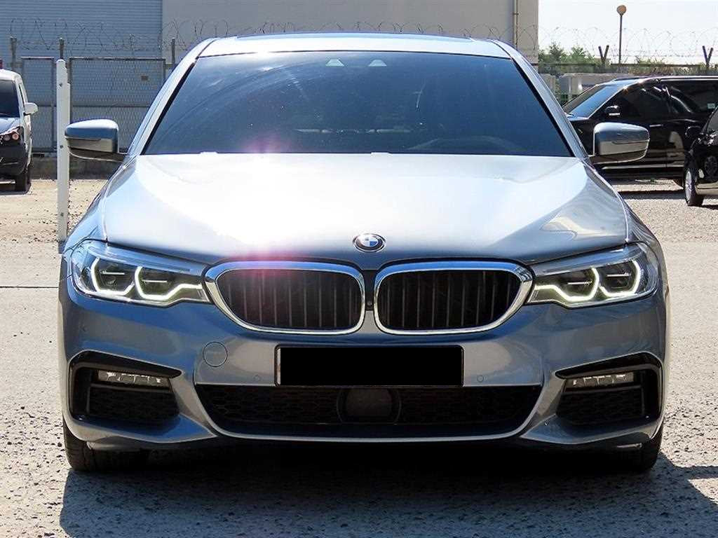 BMW 5-Series — photo 01