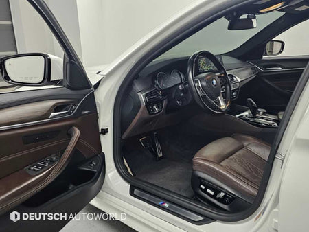 BMW 5-Series — photo 11