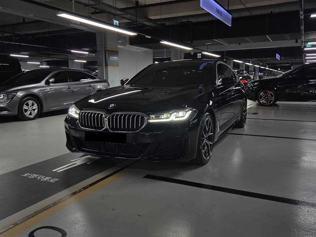 BMW 5-Series — photo 01