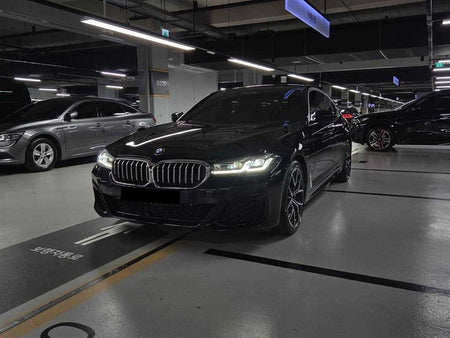 BMW 5-Series — photo 01