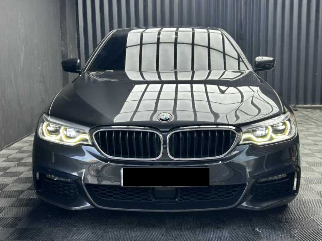 BMW 5-Series — photo 01