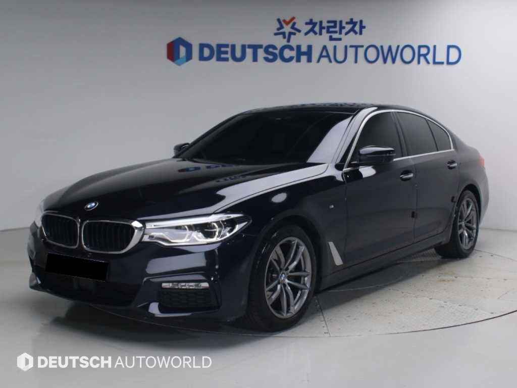 BMW 5-Series — photo 01