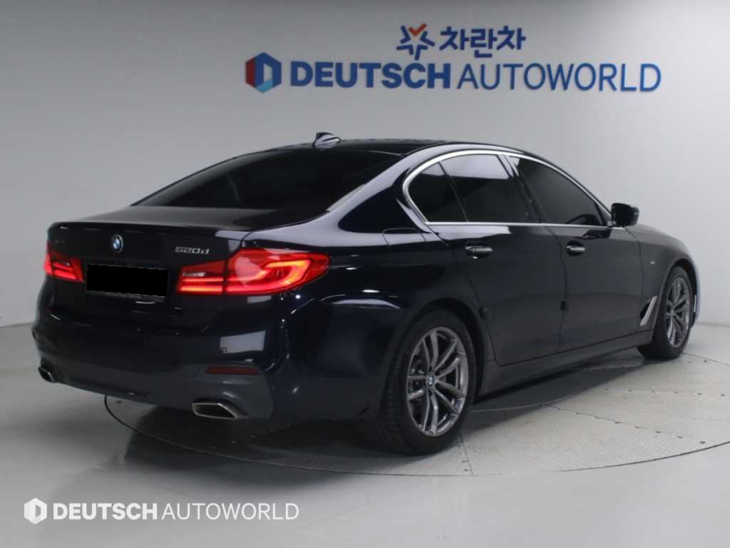 BMW 5-Series — photo 02