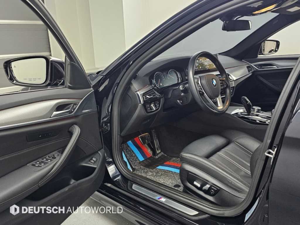 BMW 5-Series — photo 11