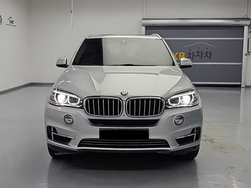 BMW X5 — photo 01