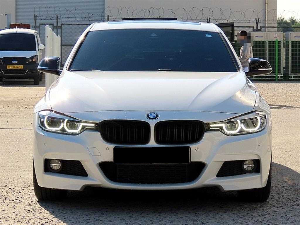 BMW 3-Series — photo 01
