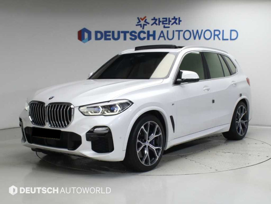 BMW X5 — photo 01