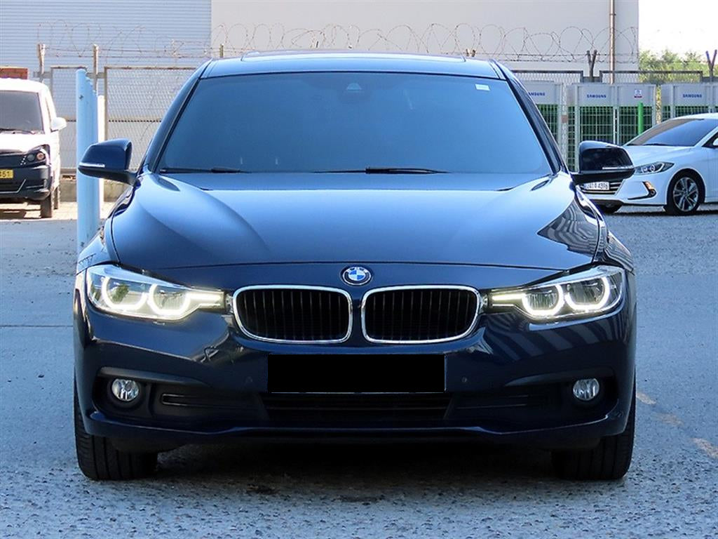 BMW 3-Series — photo 01