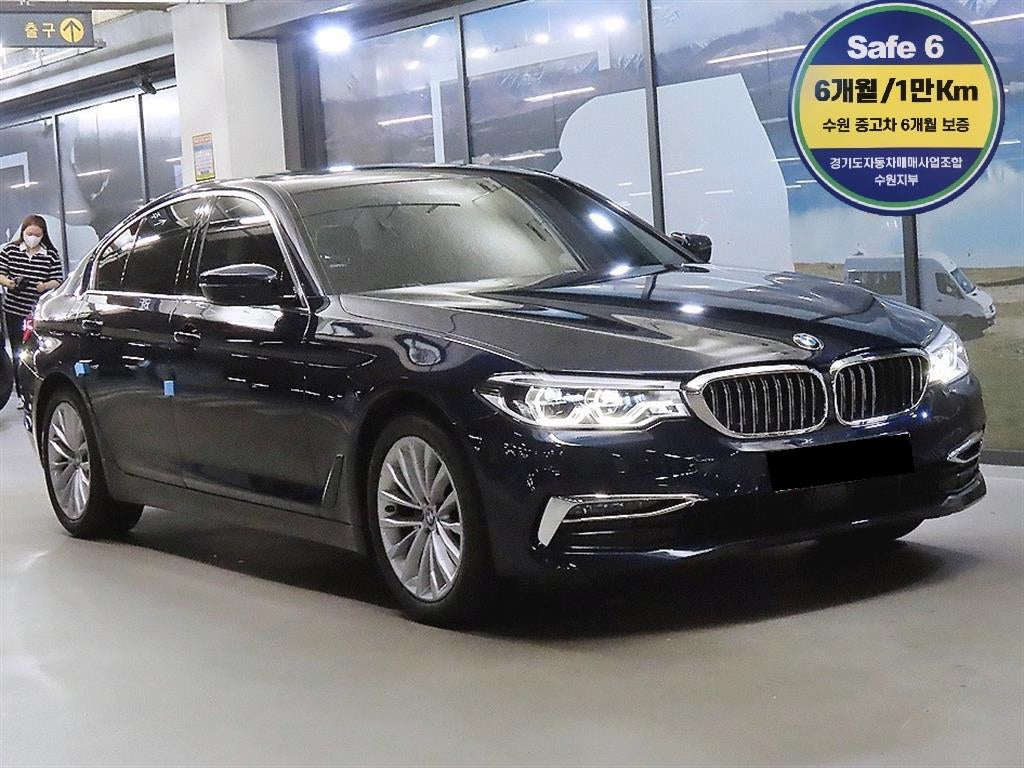 BMW 5-Series — photo 01