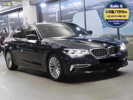 BMW 5-Series — photo 01