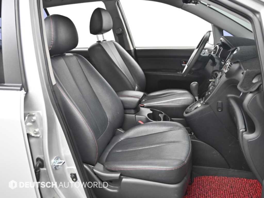Kia Carens — photo 10