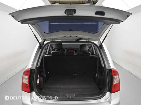 Kia Carens — photo 19