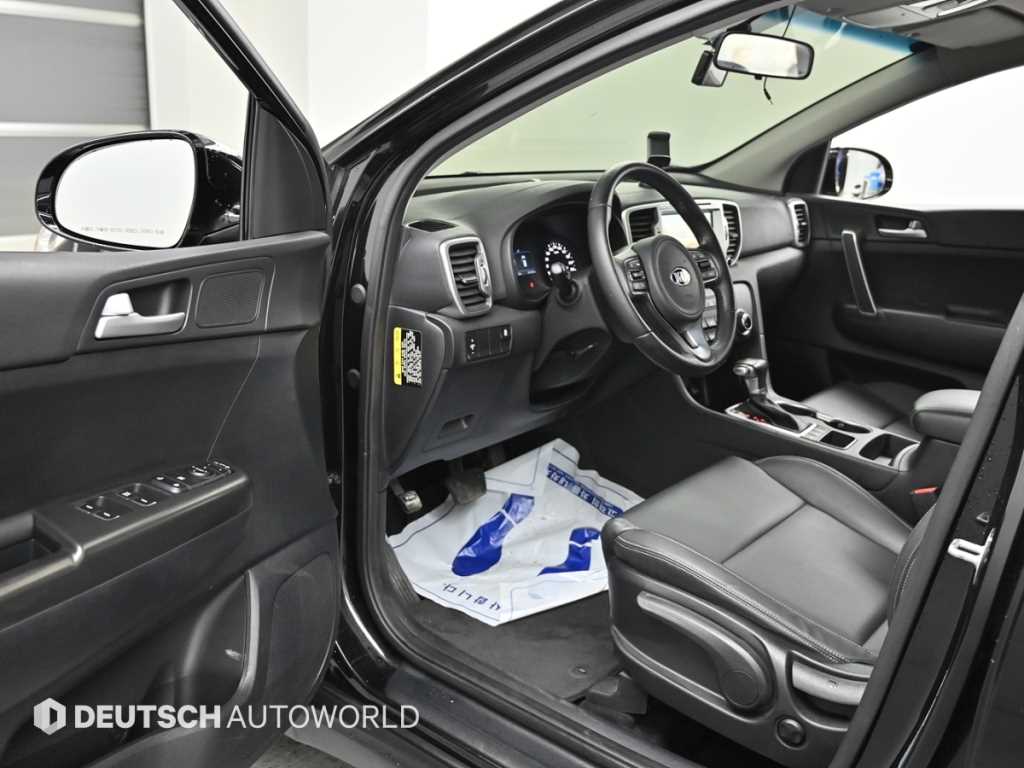 Kia Sportage — photo 11