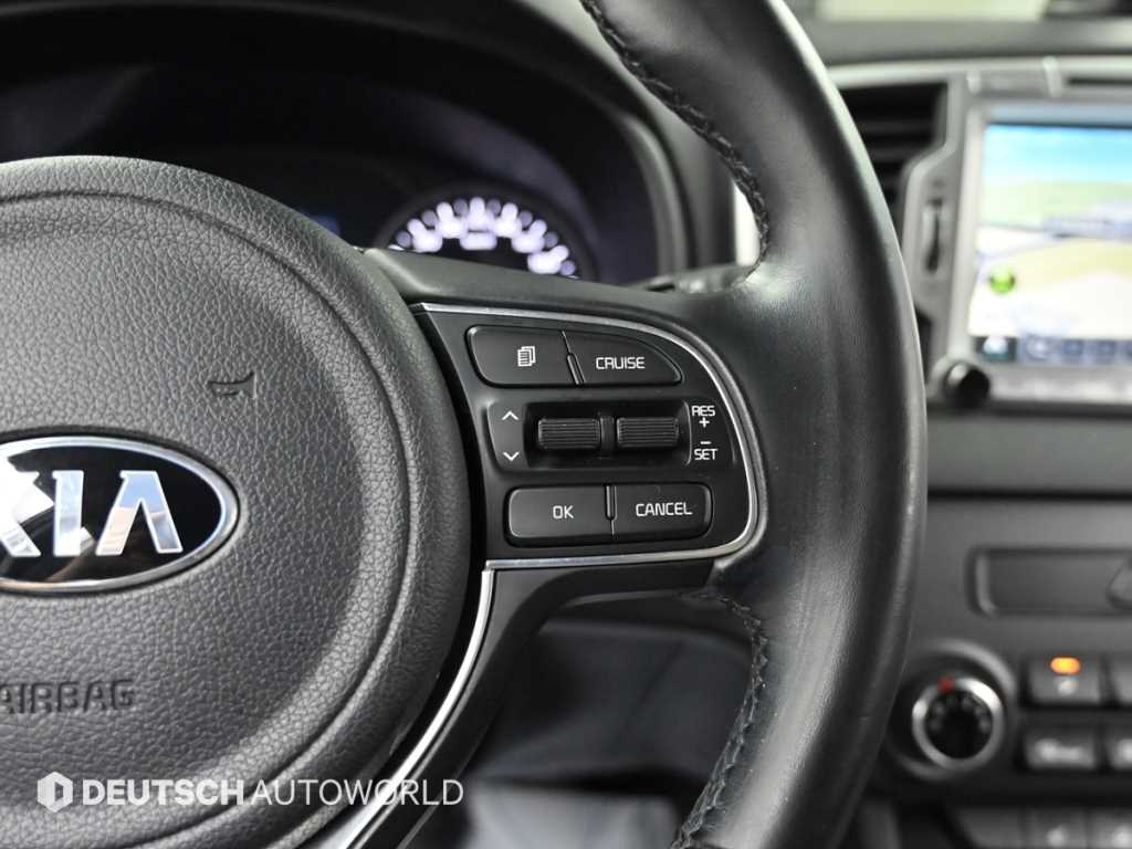 Kia Sportage — photo 16
