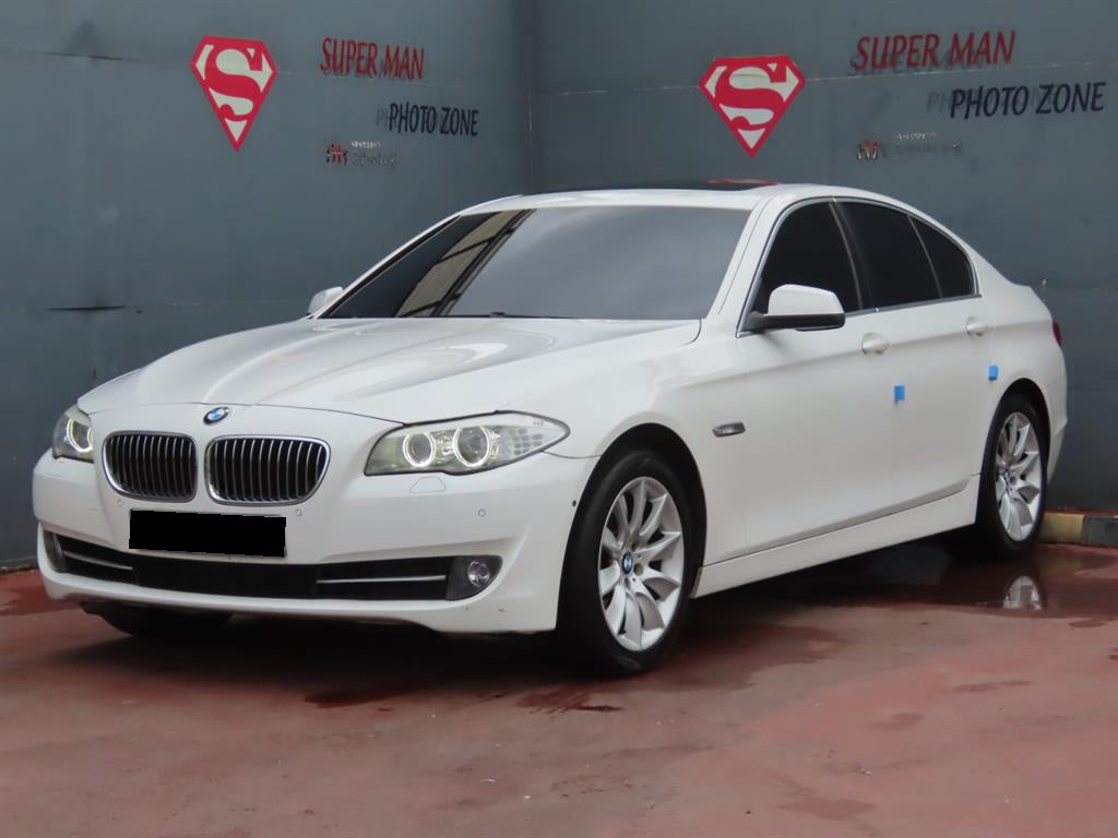 BMW 5-Series — photo 01