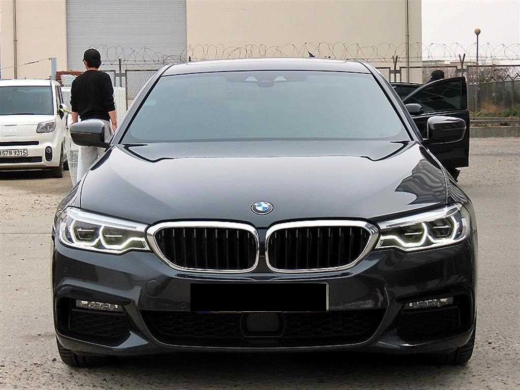 BMW 5-Series — photo 01