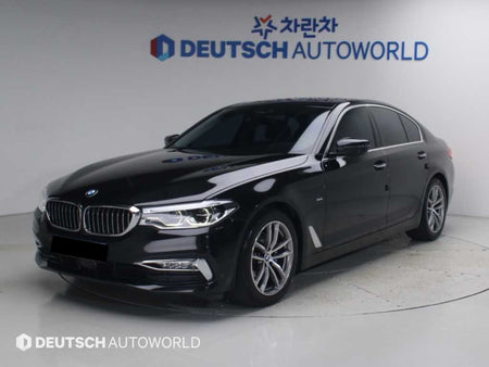 BMW 5-Series — photo 01