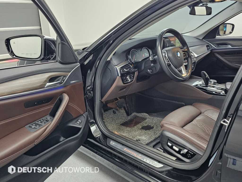 BMW 5-Series — photo 11